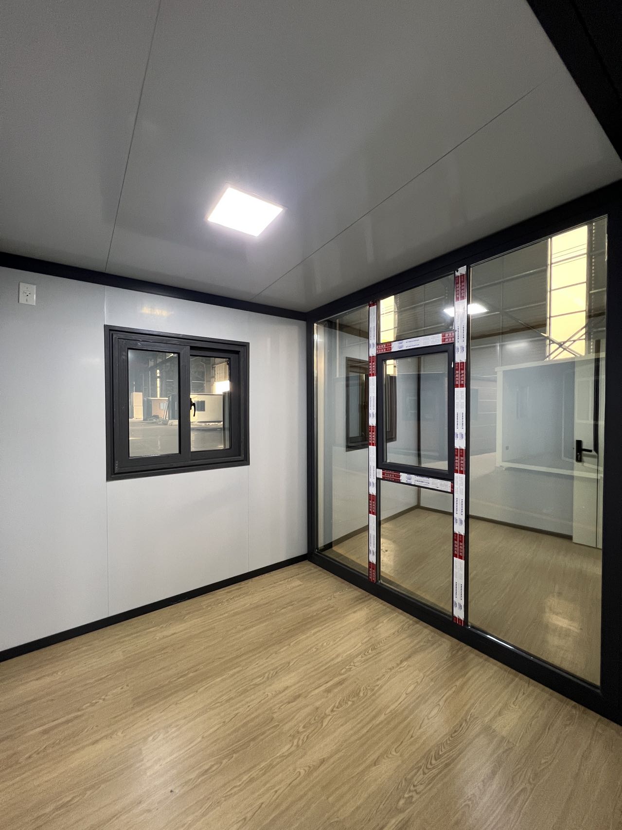 Modelo 20ft muro vidrio interior
